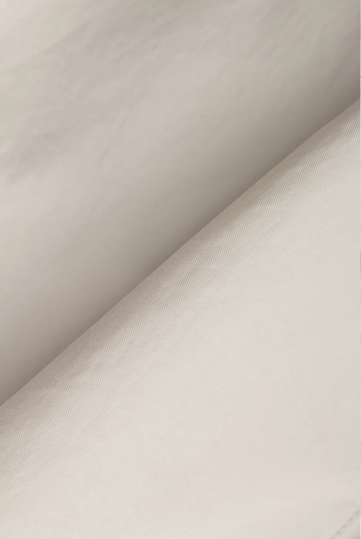 The Coastal Zip Jacket is crafted from our signature pop twill with a dry hand feel — exceptionally lightweight, breathable, and softly structured. Designed with a relaxed silhouette, it features oversized slash pockets and a double zipper closure for versatile styling.