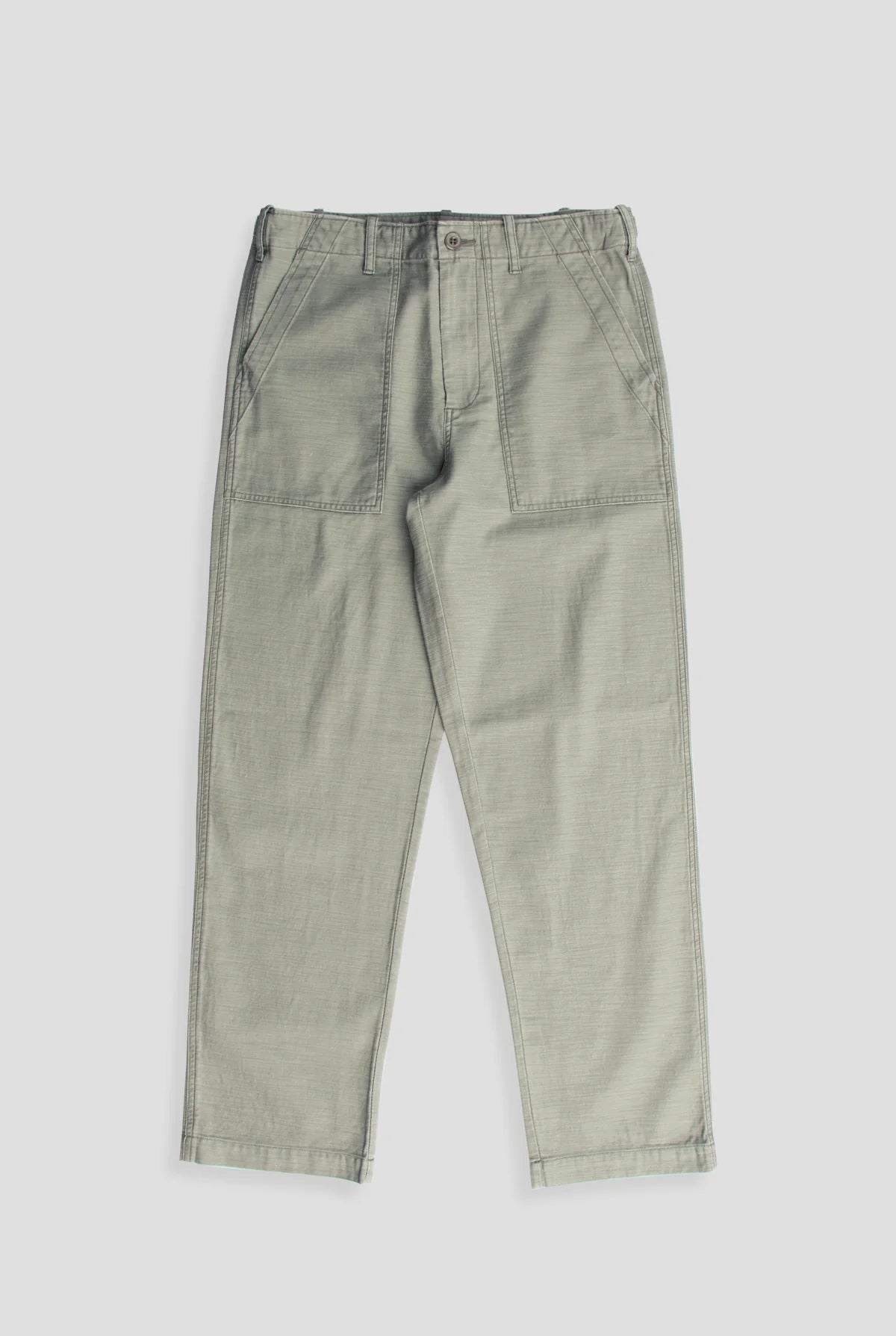 Our Surplus Pants are cut from our custom vintage dobby fabric, featuring the slub side for subtle texture. The relaxed silhouette offers comfort without compromising structure. Stone-washed for added softness, they feel instantly familiar—an understated staple that fits into your everyday wardrobe. Updated with a longer inseam.