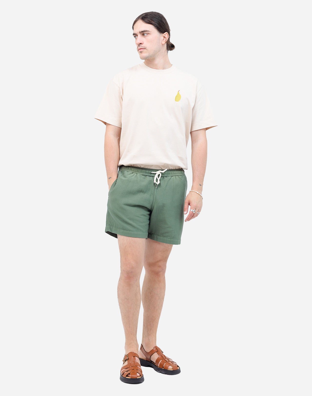 A summer wardrobe essential. With its elasticated waistband, loose fit, mid-thigh length, and soft cotton fabric enhanced by tonal topstitching, once you try the Bodhi shorts, you'll never look back (and they come in several colors and materials, for almost every day of the week).