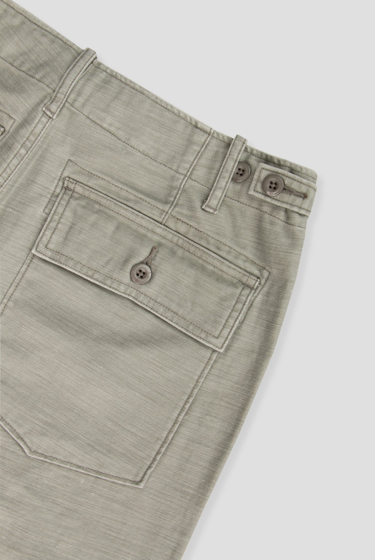 Our Surplus Pants are cut from our custom vintage dobby fabric, featuring the slub side for subtle texture. The relaxed silhouette offers comfort without compromising structure. Stone-washed for added softness, they feel instantly familiar—an understated staple that fits into your everyday wardrobe. Updated with a longer inseam.