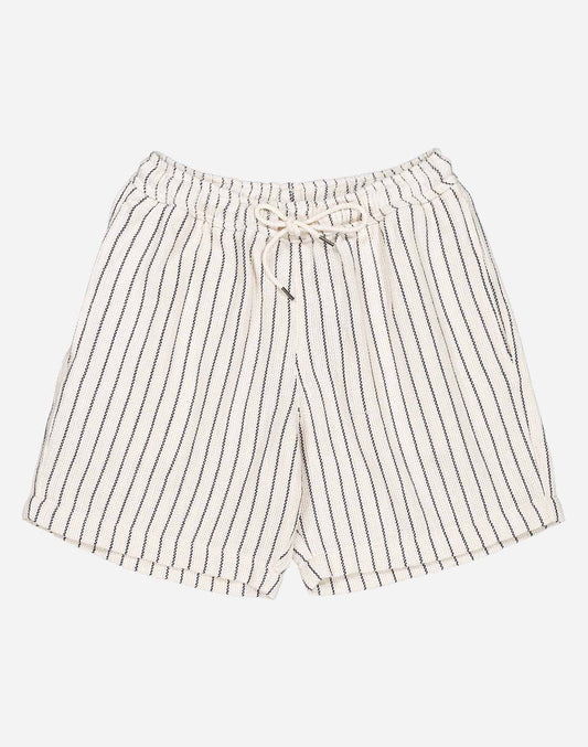A summer wardrobe essential. With its elasticated waistband, loose fit, mid-thigh length, and soft cotton fabric enhanced by tonal topstitching, once you try the Bodhi shorts, you'll never look back (and they come in several colors and materials, for almost every day of the week).