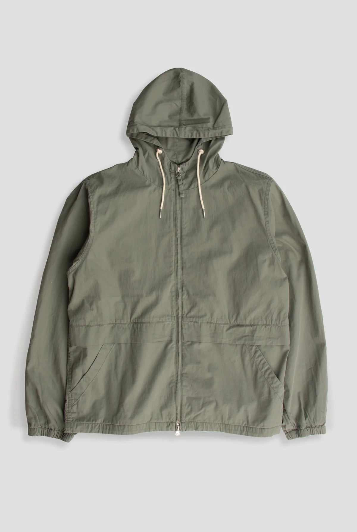 The Coastal Zip Jacket is crafted from our signature pop twill with a dry hand feel — exceptionally lightweight, breathable, and softly structured. Designed with a relaxed silhouette, it features oversized slash pockets and a double zipper closure for versatile styling.