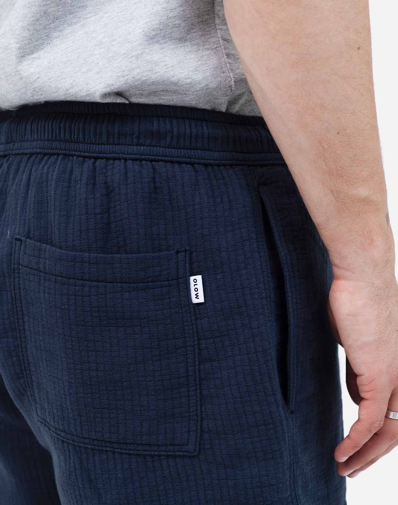 A summer wardrobe essential. With its elasticated waistband, loose fit, mid-thigh length, and soft cotton fabric enhanced by tonal topstitching, once you try the Bodhi shorts, you'll never look back (and they come in several colors and materials, for almost every day of the week).
