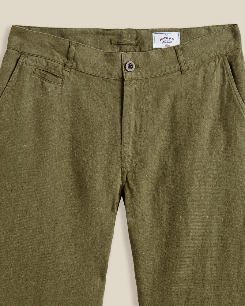 Portuguese Flannel's trousers are made from linen that's milled in Guimarães; the brand's home since 1927. Dyed navy, they're cut in a neat, straight-leg shape and have a little coin pocket by the waistband. Lower Impact Materials. This product is made using at least 50% lower-impact materials or ingredients.