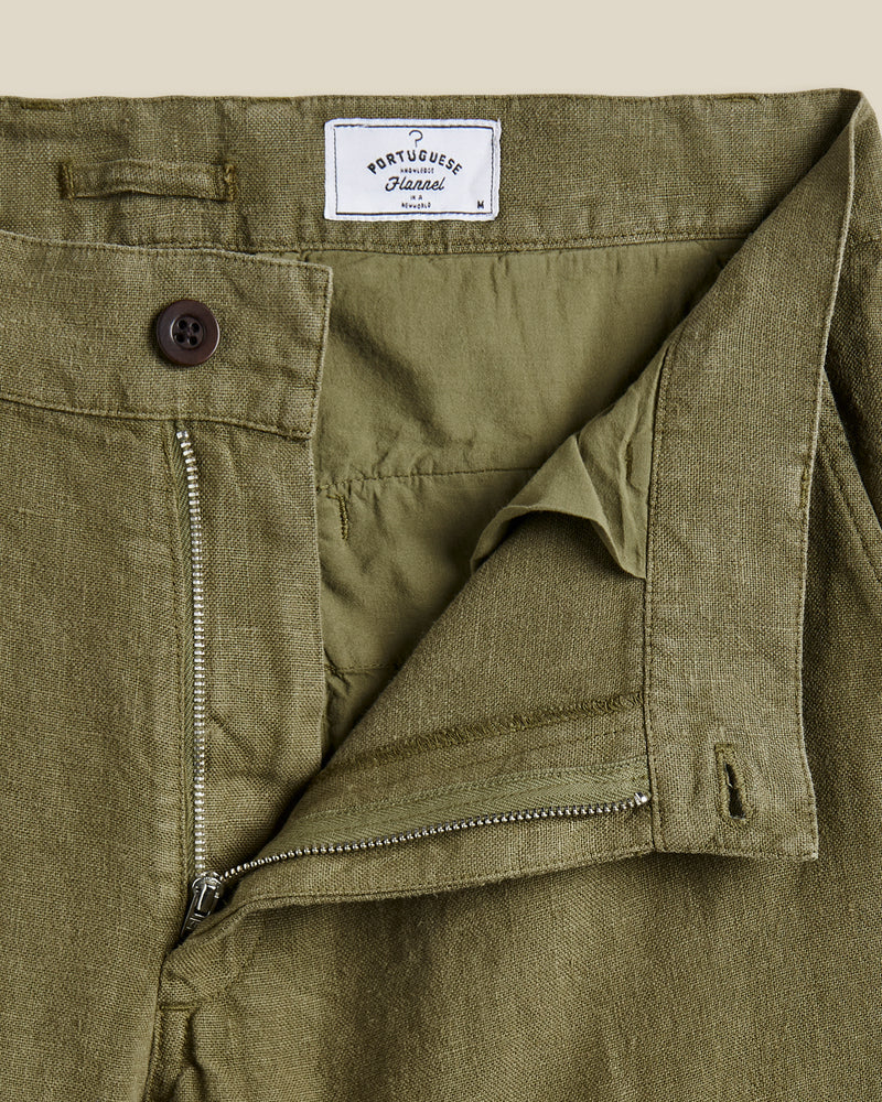 Portuguese Flannel's trousers are made from linen that's milled in Guimarães; the brand's home since 1927. Dyed navy, they're cut in a neat, straight-leg shape and have a little coin pocket by the waistband. Lower Impact Materials. This product is made using at least 50% lower-impact materials or ingredients.