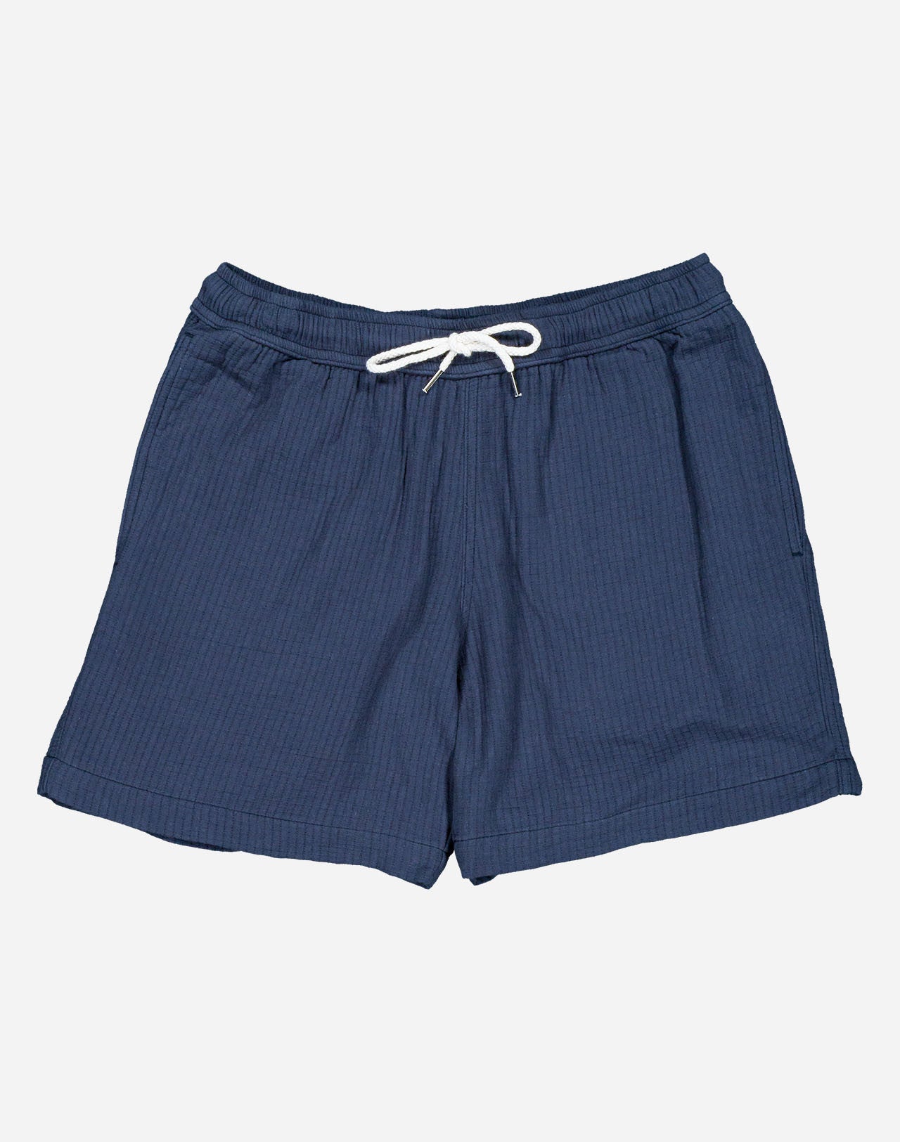 A summer wardrobe essential. With its elasticated waistband, loose fit, mid-thigh length, and soft cotton fabric enhanced by tonal topstitching, once you try the Bodhi shorts, you'll never look back (and they come in several colors and materials, for almost every day of the week).
