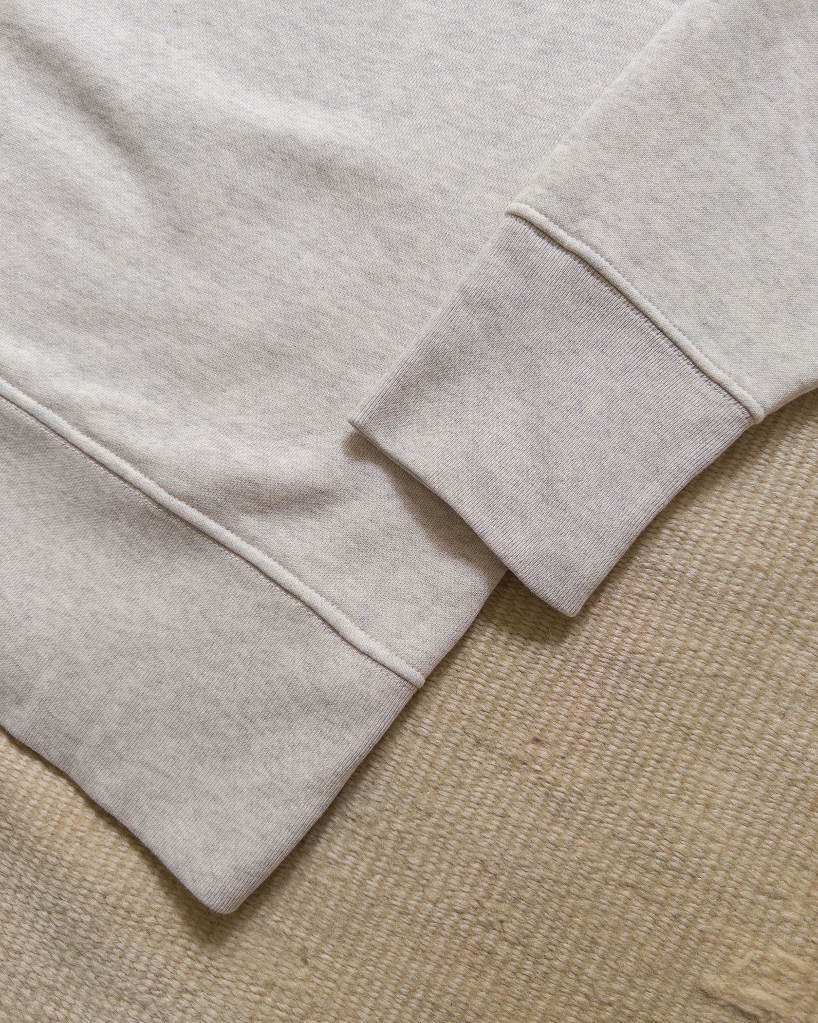Cotton Sweatshirts were first used as athletic garments in the 1920s and 30s and always featured full length ribknit cuffs and hems, and V-shaped inserts in the neckline. The Wythe Sweatshirt stays true to these details, and adds a subtle curve into the V insert (lovingly called "Doritos" by some vintage aficionados) that gracefully matches the curve of the neckline.

Our crewneck sweatshirt has been a Wythe staple from the very beginning and was one of our earliest products. White we really loved the slimm