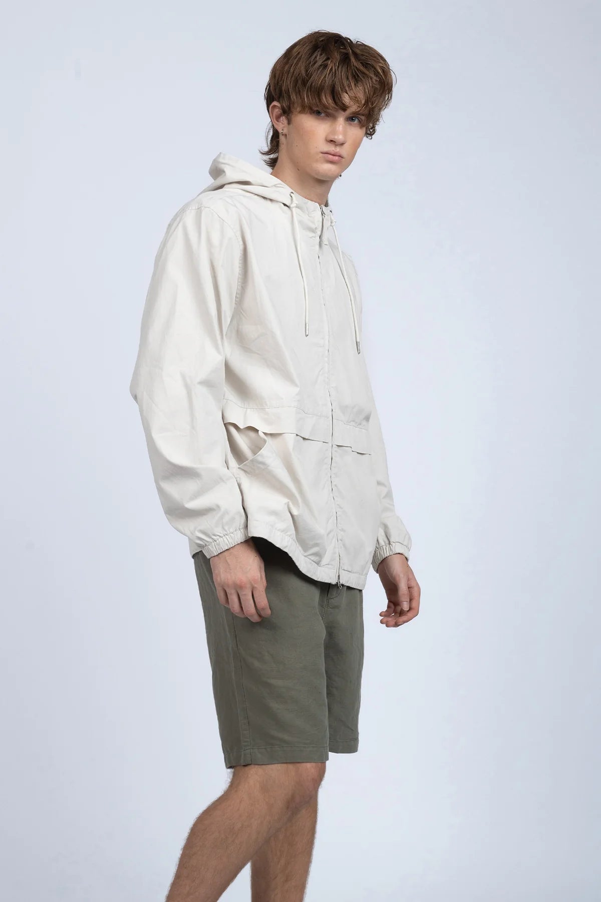 The Coastal Zip Jacket is crafted from our signature pop twill with a dry hand feel — exceptionally lightweight, breathable, and softly structured. Designed with a relaxed silhouette, it features oversized slash pockets and a double zipper closure for versatile styling.