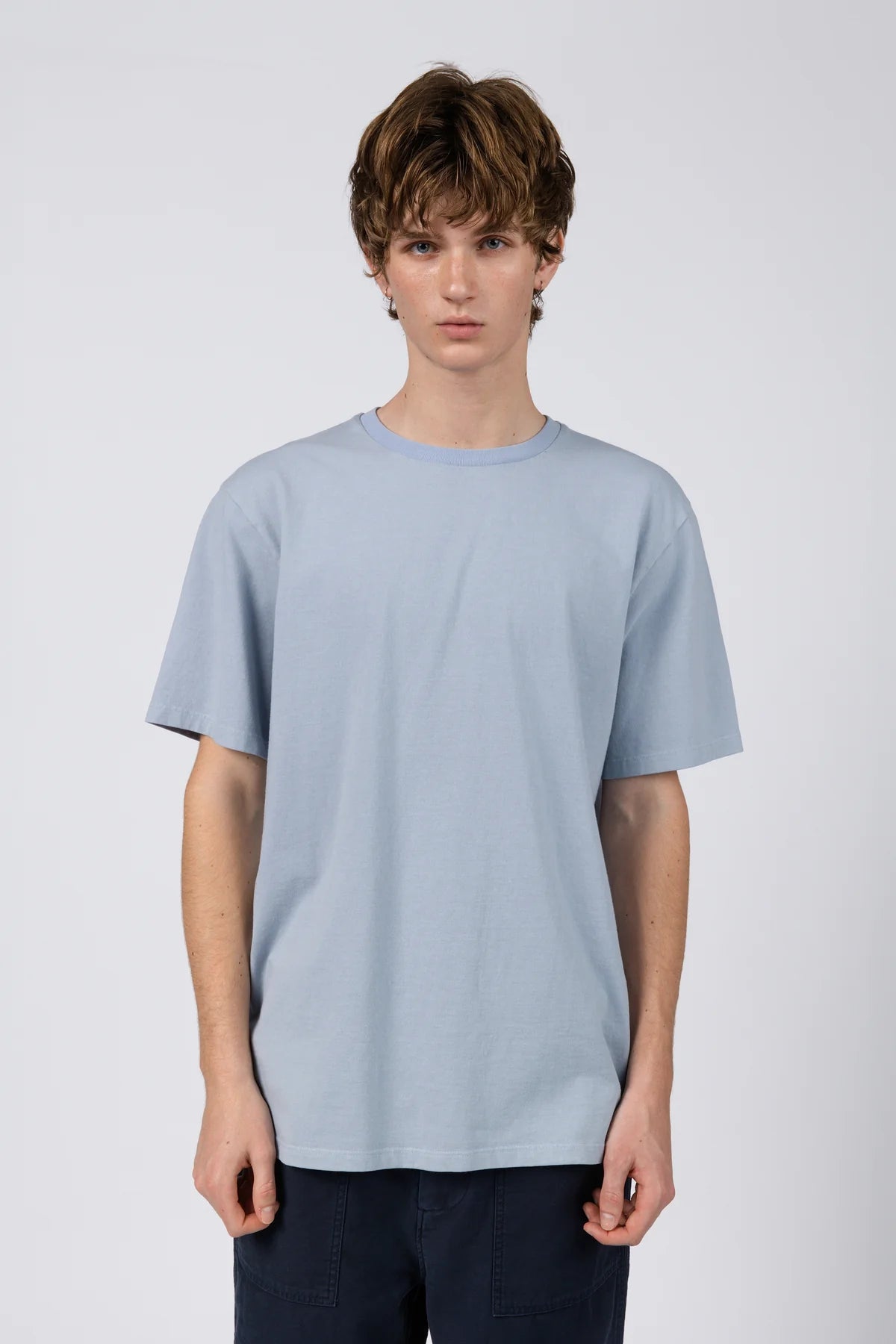 A foundational piece, thoughtfully executed. Cut from 100% cotton, this tee is all about feel and fit—soft, and endlessly wearable. With a clean silhouette and refined simplicity, it’s the kind of essential you’ll reach for every day, designed to hold its shape and softness wash after wash.