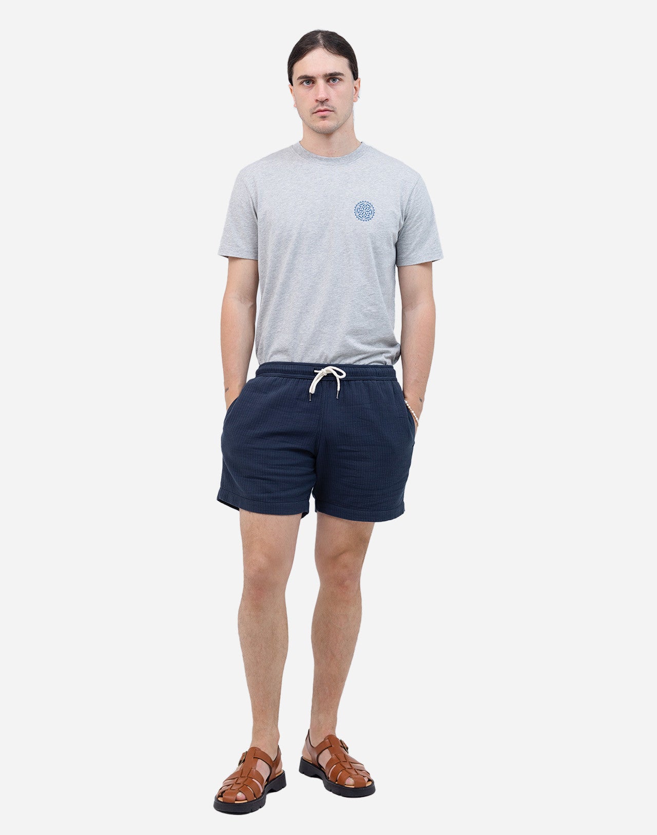 A summer wardrobe essential. With its elasticated waistband, loose fit, mid-thigh length, and soft cotton fabric enhanced by tonal topstitching, once you try the Bodhi shorts, you'll never look back (and they come in several colors and materials, for almost every day of the week).
