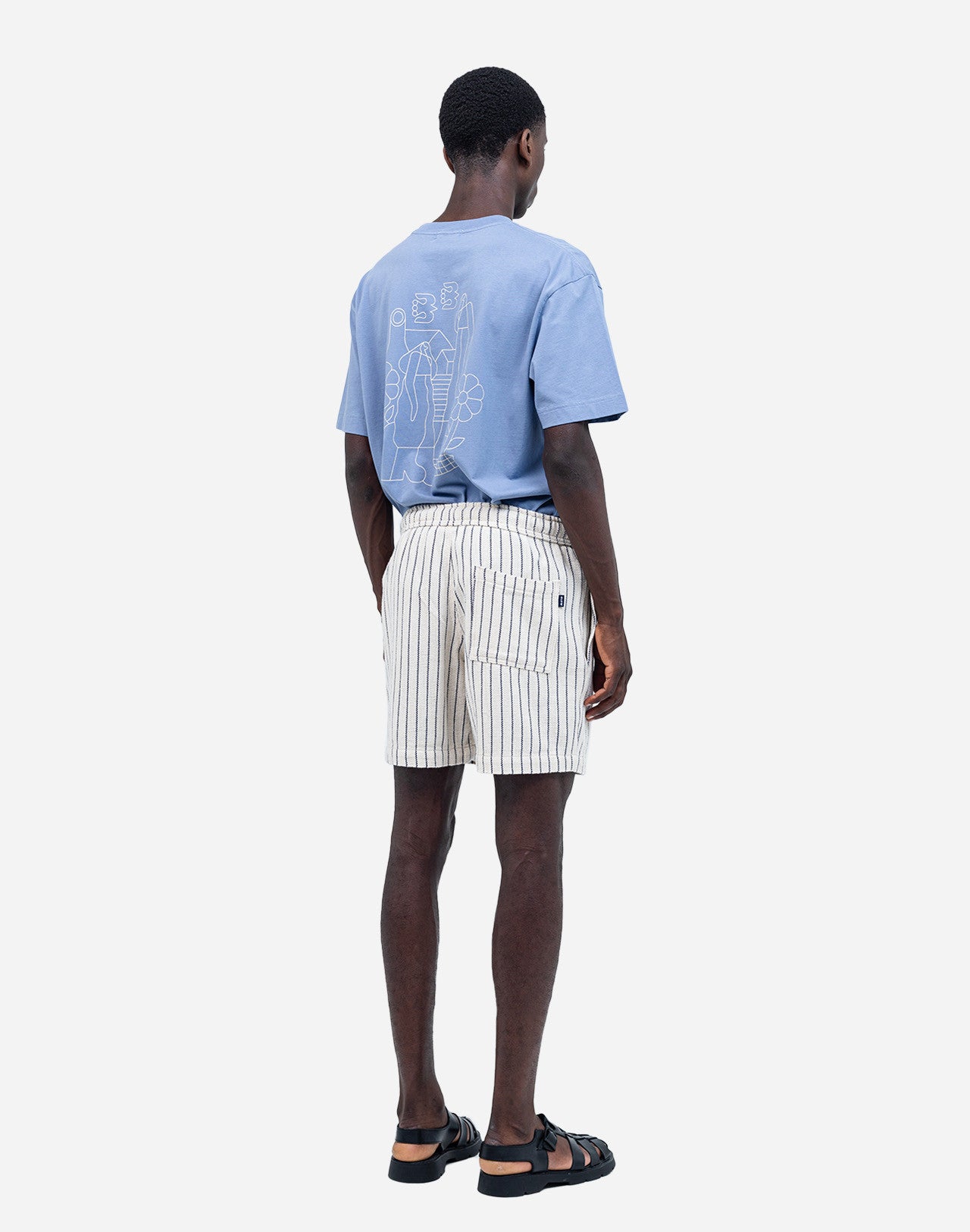 A summer wardrobe essential. With its elasticated waistband, loose fit, mid-thigh length, and soft cotton fabric enhanced by tonal topstitching, once you try the Bodhi shorts, you'll never look back (and they come in several colors and materials, for almost every day of the week).
