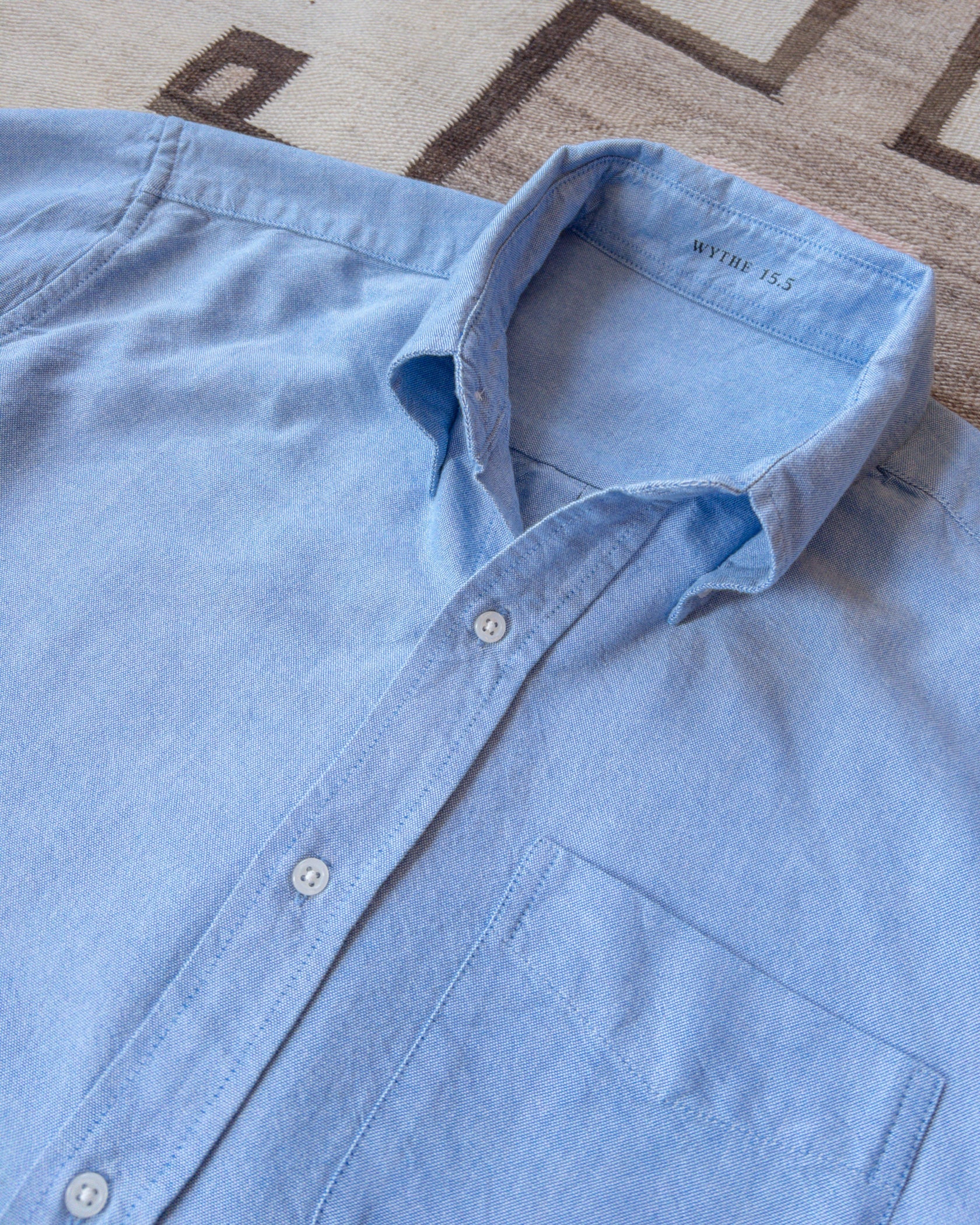 The first product from Wythe. These oxfords were inspired by vintage American oxfords from the 1960's worn by every leading man from Miles Davis to Paul Newman.

We kept the original generous button down collar that is unlined for an expressive roll that looks just as great button or left unbuttoned and left to fly. This oxford is cut to fit comfortably relaxed against the body, not exactly slim but not at all the baggy shirts you may associate with oxfords.

All Wythe oxford shirts are washed multiple time