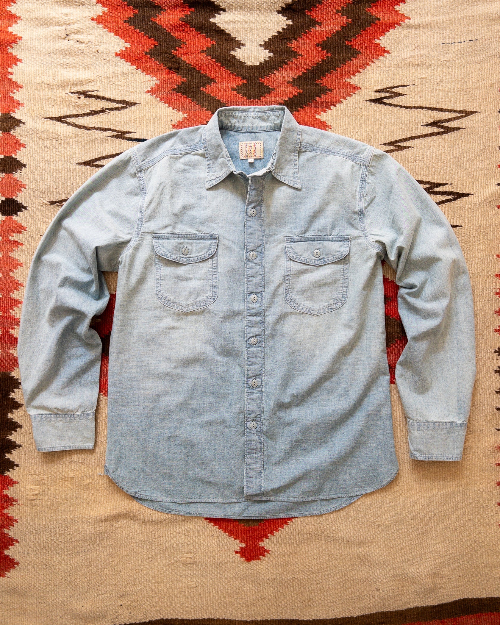 I know we say this again and again, but this is a true classic. Hardy chambray shirts were the workforce shirt used by everyone from US Naval Sailors, railroad workers out west, to grainbasket farmers and their families. Loved by Paul Newman in "Cool Hand Luke" and evolved into a Rivera staple in the 60s and 70s. Chambray pairs equally well with blue jeans as it does with khakis and suitings. The Wythe chambray used indigo dyed yarns chosen carefully for their irregular slubs to retain the same character as