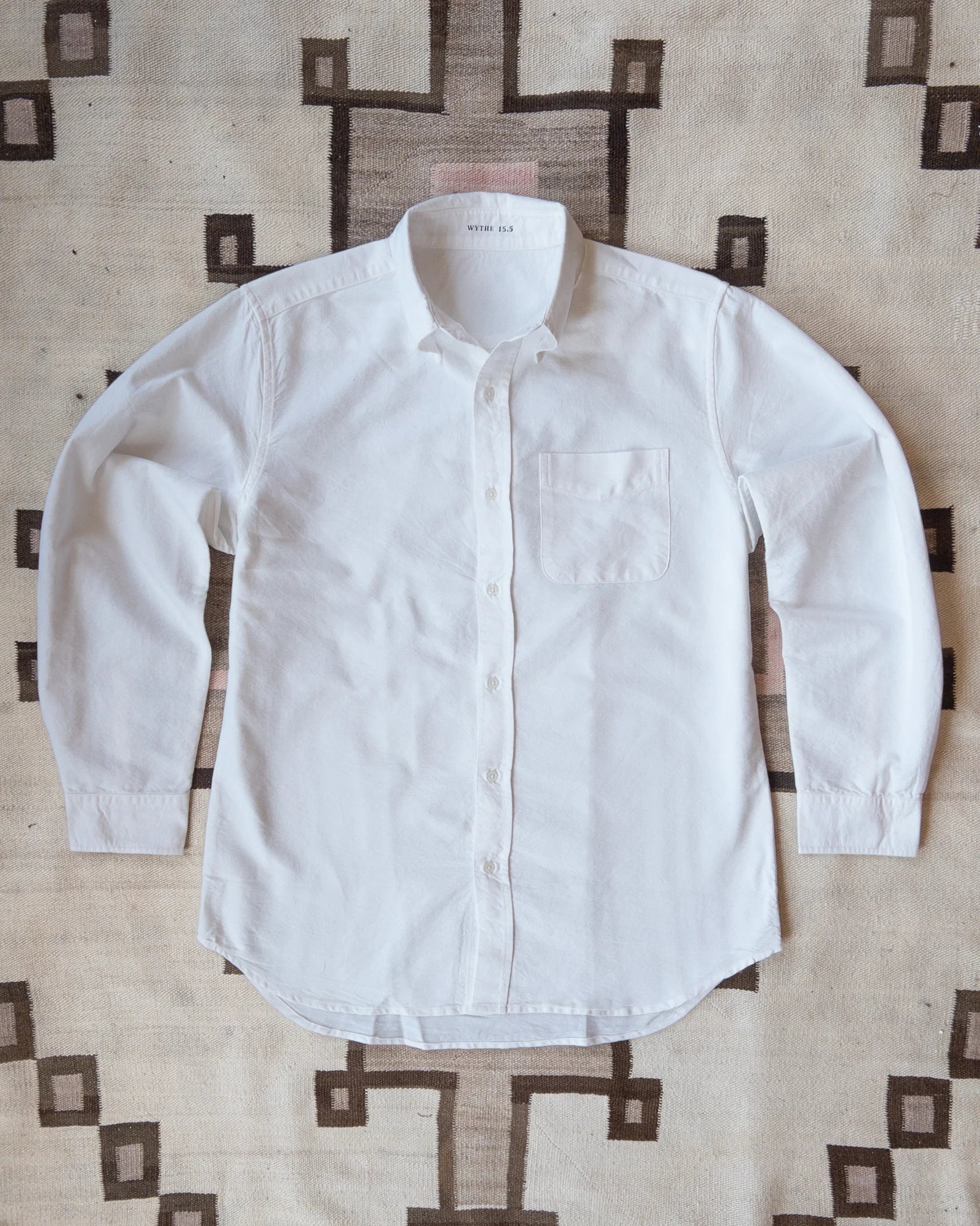 The first product from Wythe. These oxfords were inspired by vintage American oxfords from the 1960's worn by every leading man from Miles Davis to Paul Newman.

We kept the original generous button down collar that is unlined for an expressive roll that looks just as great button or left unbuttoned and left to fly. This oxford is cut to fit comfortably relaxed against the body, not exactly slim but not at all the baggy shirts you may associate with oxfords.

All Wythe oxford shirts are washed multiple time