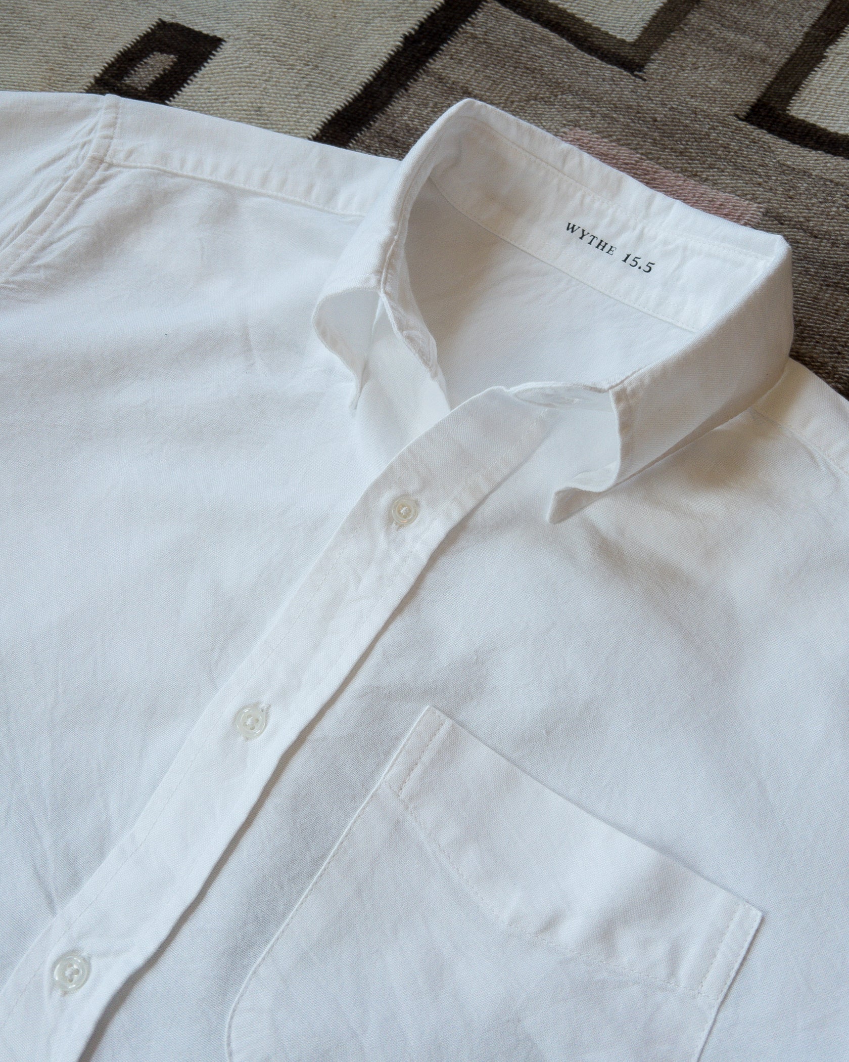 The first product from Wythe. These oxfords were inspired by vintage American oxfords from the 1960's worn by every leading man from Miles Davis to Paul Newman.

We kept the original generous button down collar that is unlined for an expressive roll that looks just as great button or left unbuttoned and left to fly. This oxford is cut to fit comfortably relaxed against the body, not exactly slim but not at all the baggy shirts you may associate with oxfords.

All Wythe oxford shirts are washed multiple time